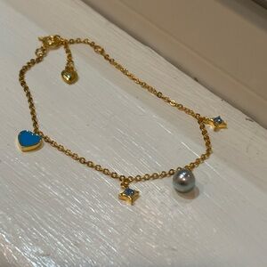 Madama Pearl On Gold Colored Sterling Silver Bracelet With Blue Charms